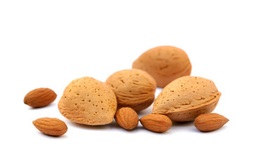 Fresh almonds in shells isolated on white background