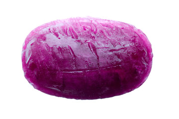 close-up shot of a purple candy on white background.