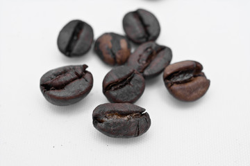 three coffee beans isolated on white background