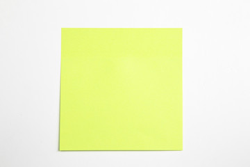 green stick note isolated on white background