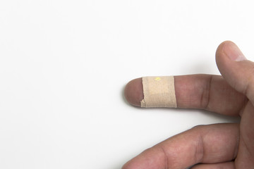 bandaid on hand isolated on white background