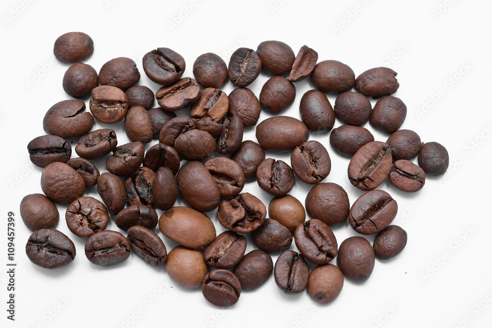 Wall mural coffee beans isolated on white background