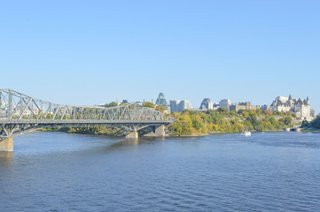 Fototapeta na wymiar Ottawa city skyline panorama over river with urban historical buildings