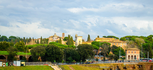 Obraz premium Ruins of Circus Maximus and Palatine hill palace in Rome, It