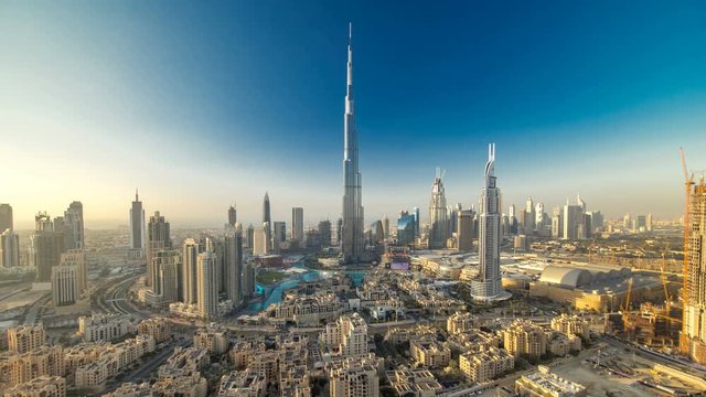 Dubai Downtown at evening timelapse view from the top in Dubai, United Arab Emirates