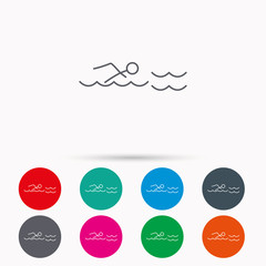 Swimming icon. Swimmer in waves sign.