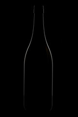 Wine glass and bottle on black background rim lighting