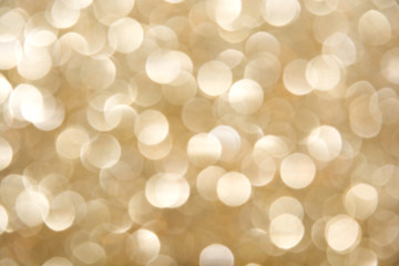 Fototapety  De-focused blur champagne bulbs - abstract beige background