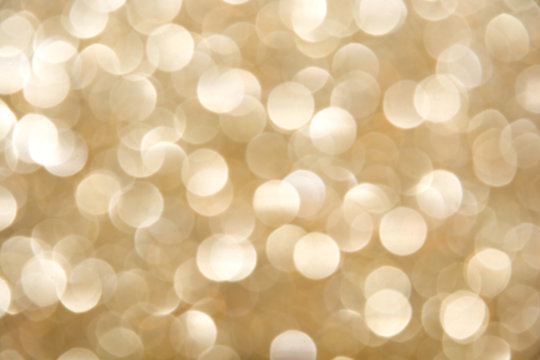 De-focused blur champagne bulbs - abstract beige background