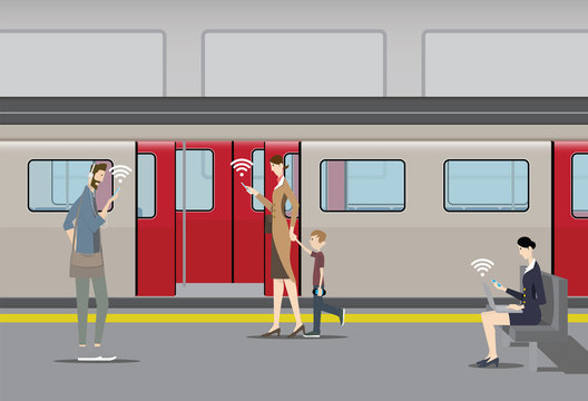 Public Free Wifi Concept. Passengers use their mobile devices on the subway platform.