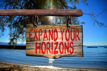 Expand your horizons motivational phrase sign