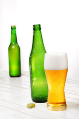 Glass and bottle of beer