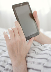 Using tablet in bed