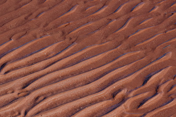 Red sands at low tide