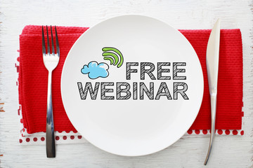 Free Webinar concept on white plate