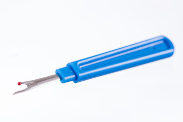 Fototapeta premium Blue seam ripper isolated on white background