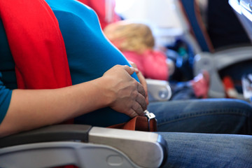 pregnant woman travel by plane