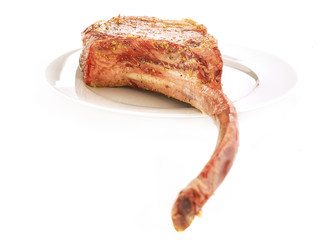 Bone-in Raw seasoned rib eye steak