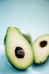 Fresh avocado cut in half
