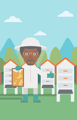 Naklejka premium Bee-keeper at apiary.