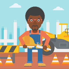 Engineer with hard hat and blueprint.