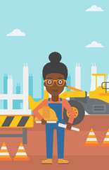 Engineer with hard hat and blueprint.