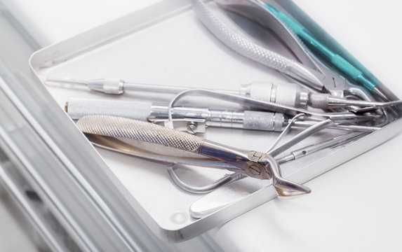 Close view of dental pliers and other dentist's tools