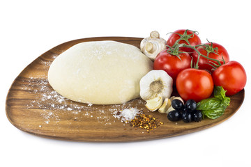 pizza dough with ingredients