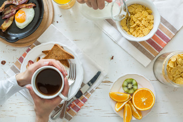 Family eating american breakfast