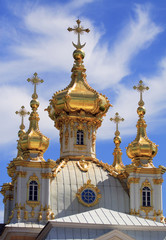 Fototapeta na wymiar Orthodox church, Christianity,golden domes and crosses , blue sky background