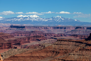 Utah-Canyonlands National Park-Island in the Sky District. This area of Island in the Sky affords one spectacular views of the Manti la Sal Mountains and the White Rim Road below