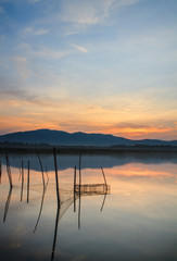 The fish trap in lake In the dawn light.