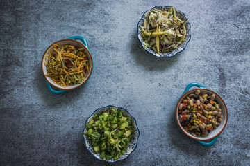 assorted salads in bowls from above