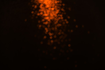 abstract bokeh light on dark background