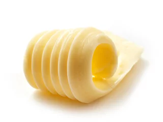 Foto op Plexiglas curl of butter © Mara Zemgaliete