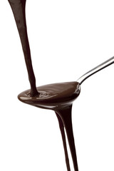 pouring chocolate syrup on the spoon