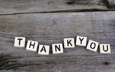 Text: Thankyou from wooden letters on wooden background