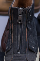 black leather boot with zipper