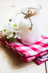 Milk on rustic table
