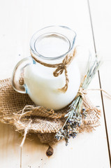 Milk on rustic table