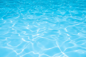 Plakat Ripple Water in swimming pool witn sun reflection