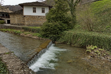 Fototapeta na wymiar Old traditional houses and river with bridge in Etar, Gabrovo, Bulgaria 