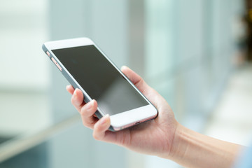 Woman use of mobile phone