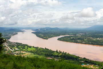 Fototapeta premium Landscape view on the mountain with blue sky and river, view from Wat Pha Tak Suea, Nong khai, Thailand