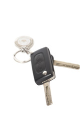 Remote control car keys with metal keyring on isolated white bac