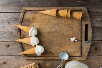 creamy vanilla ice cream in preparation with rustic background