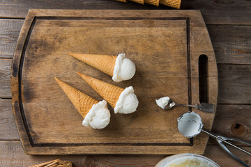 creamy vanilla ice cream in preparation with rustic background a