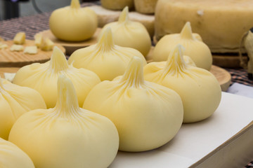Market stall with fresh artisanal cheese