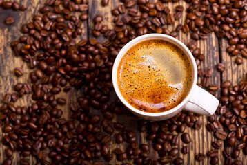 cup of coffee with beans