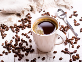 cup of coffee with beans